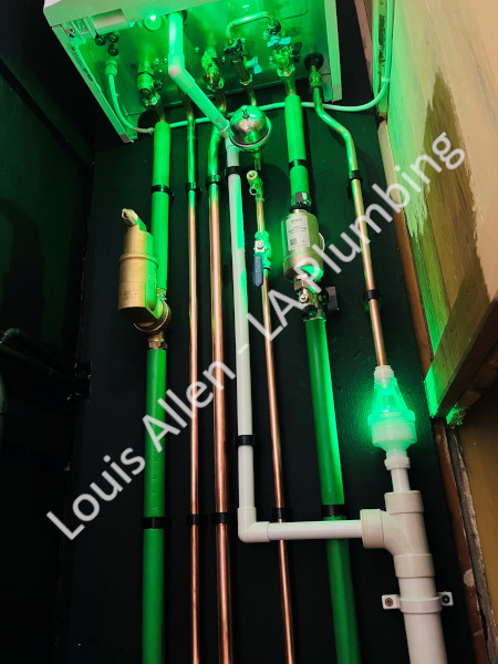 Louis Allen LA Plumbing boiler install using hotun