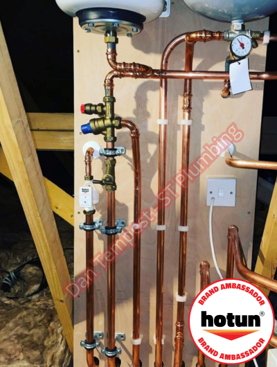 A picture of a typical boiler installation using a hotun dry trap tundish and a hotun detect alarm unit