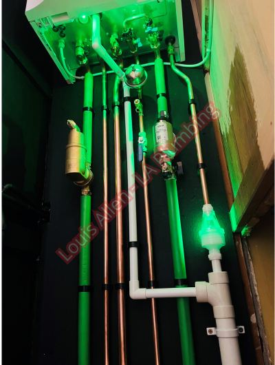 A picture of a typical boiler installation using a hotun dry trap tundish and a hotun detect alarm unit