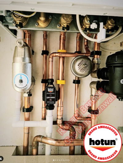 A picture of a typical boiler installation using a hotun dry trap tundish and a hotun detect alarm unit